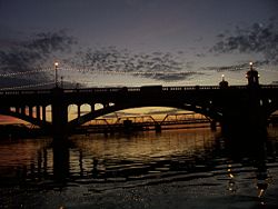 Mill Avenue Bridges over Tempe Town Lake at dusk.